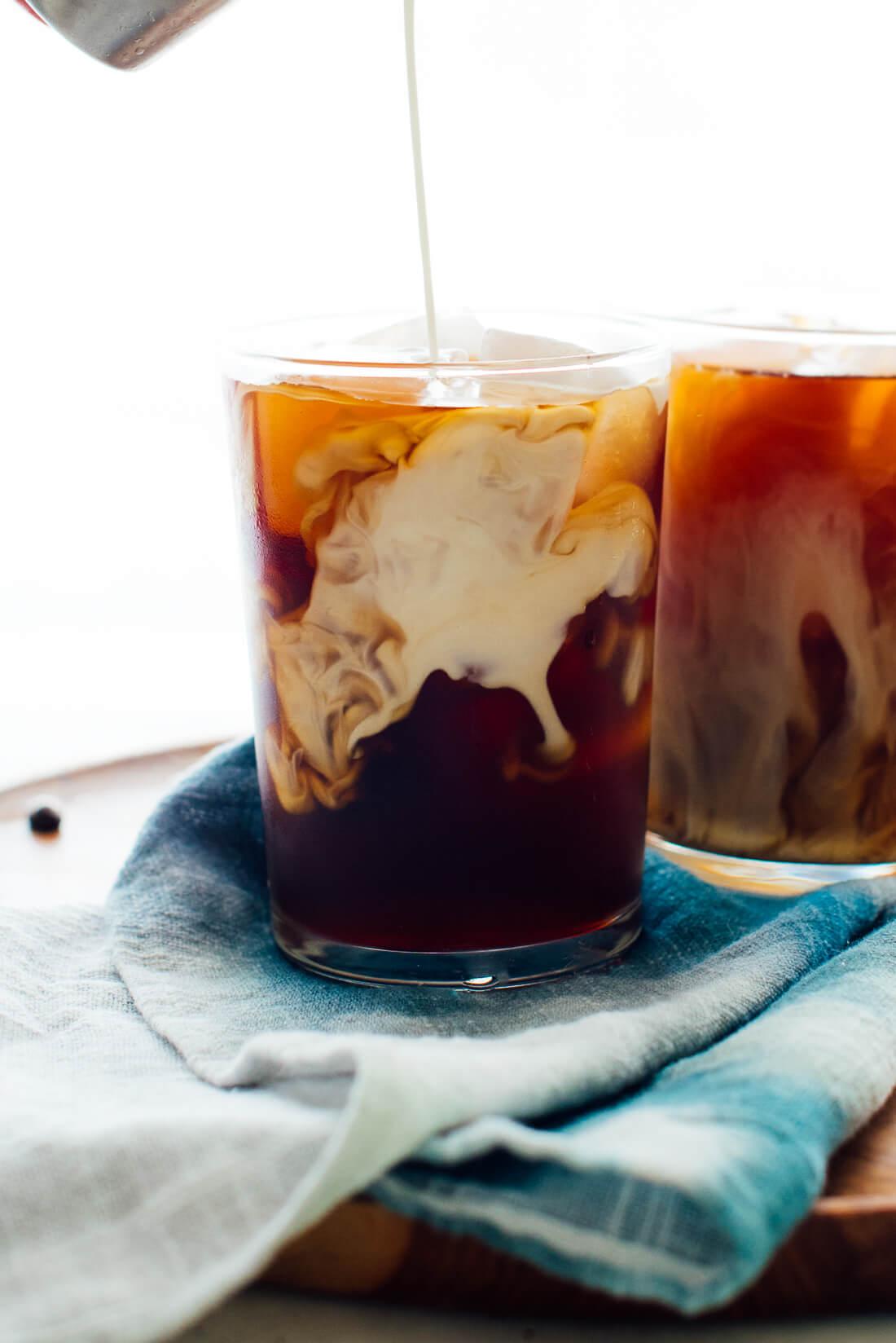 cold brew coffee with cream pour